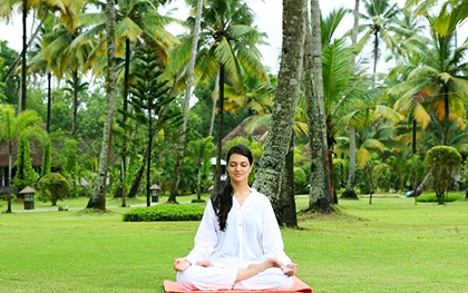 7 days ayurvedic rejuvenation package at carnoustie ayurveda & wellness resort kerala, india beach yoga in the garden1513068985.png